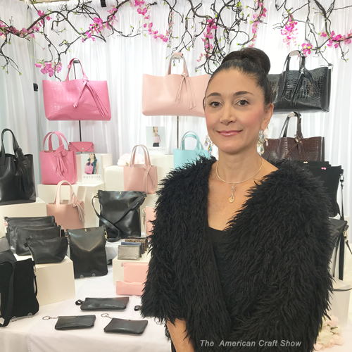 Lisa Ramos at American Craft Show with MONOLISA display and equipment