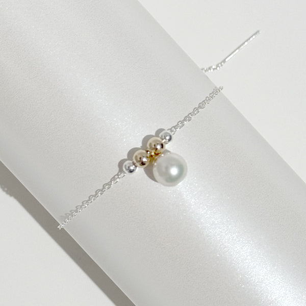 Handcrafted dainty sterling and 14k mixed metal adjustable bracelet | Designed by California Artist Lisa Ramos of MONOLISA