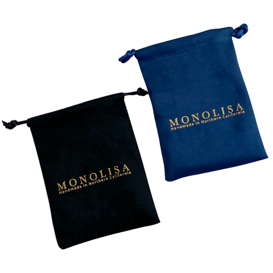 Two velvet pouches, one black and one blue, with 'MONOLISA' branding.