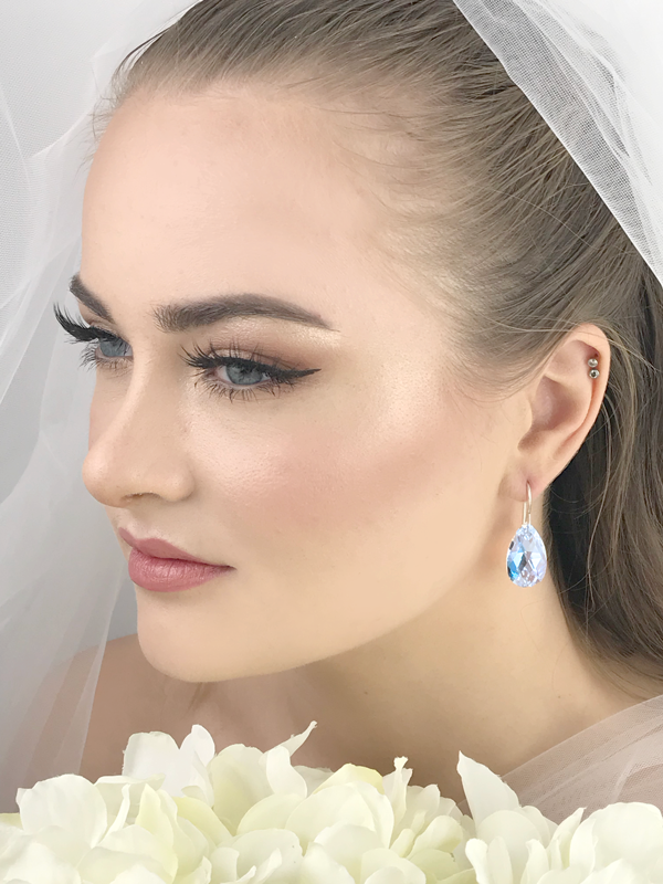 Product model Makeup by Helene Kristoffersen wearing touches of blue crystal