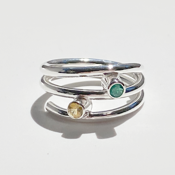 Emerald and yellow sapphire rings